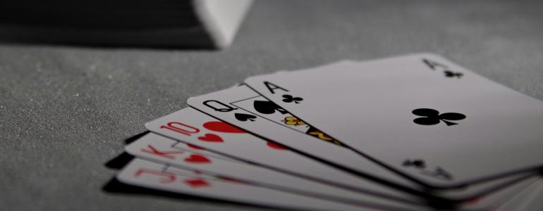 Playing cards at table