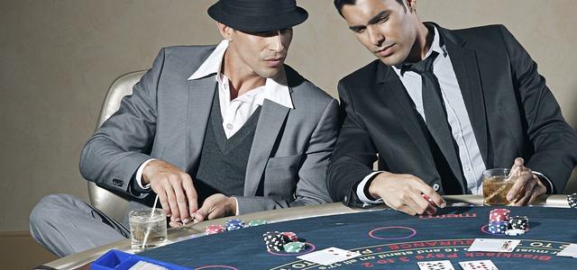 Players at poker table Players at poker table