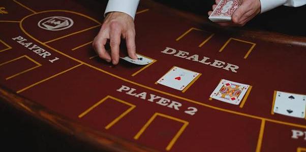 Dealar at casino table